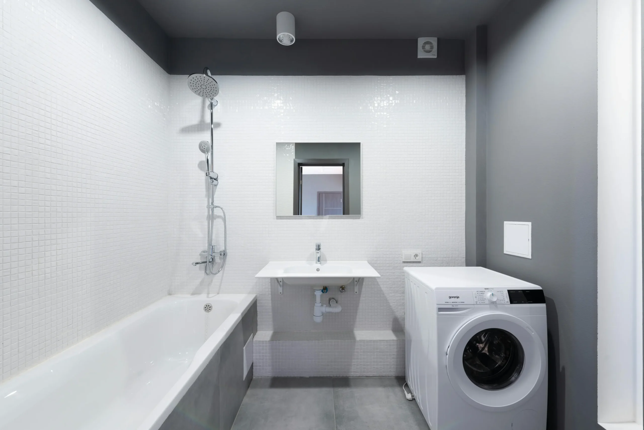 image of a room with smart laundry machine for topic on Smart Technology for Laundry Room Renovations