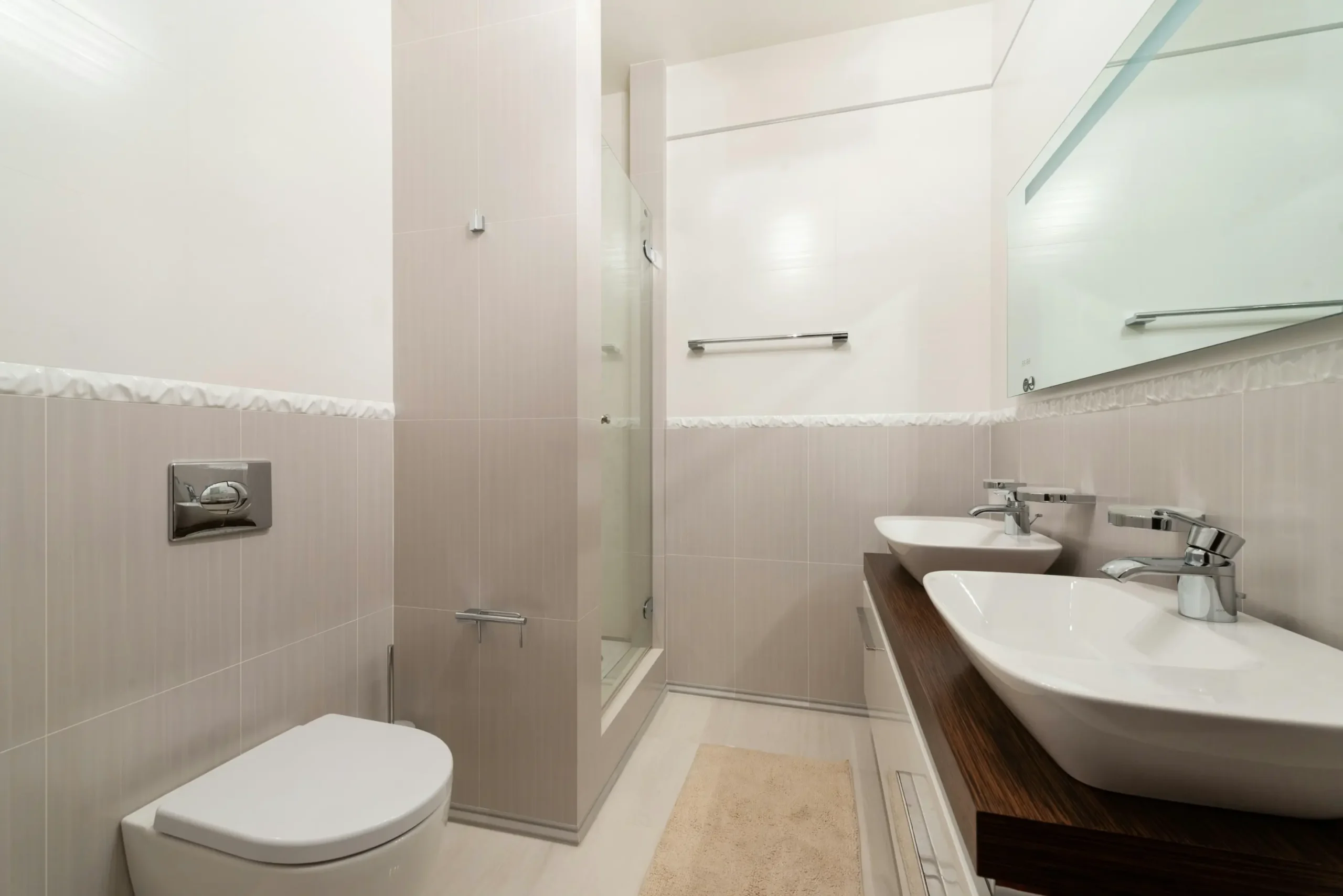 sample photo of toilet room with grab bar fixtures for topic on Bathroom Space Saving Ideas